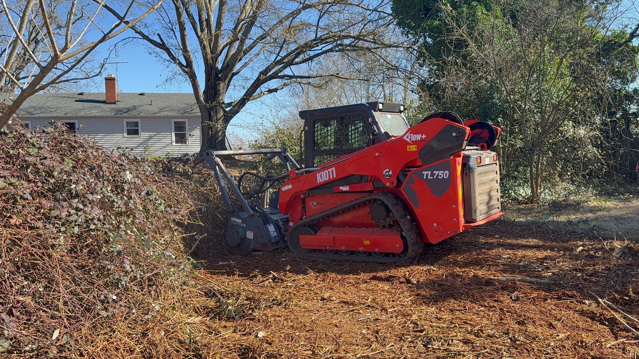 Land clearing equipment in action
