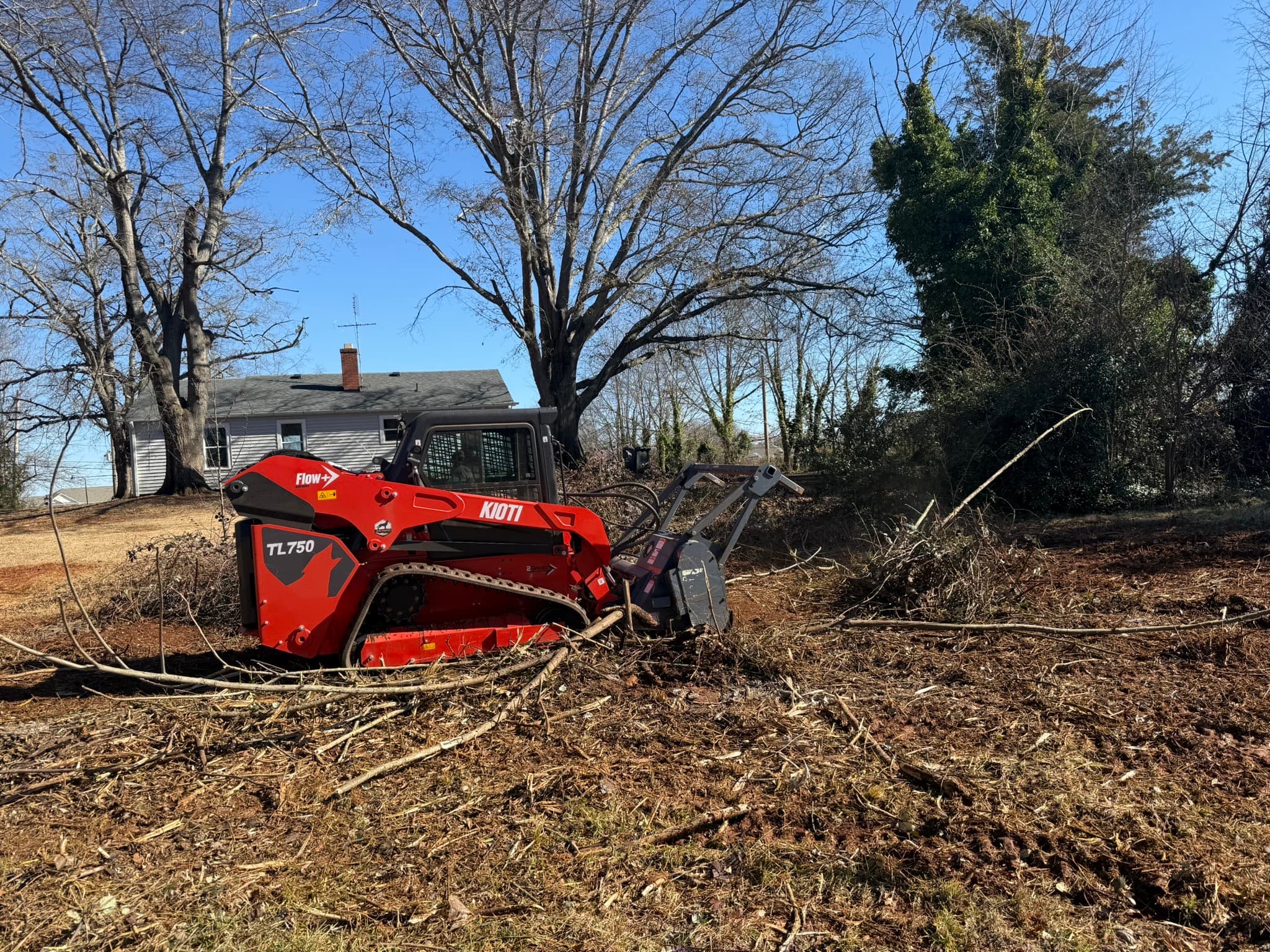 Land clearing equipment in action