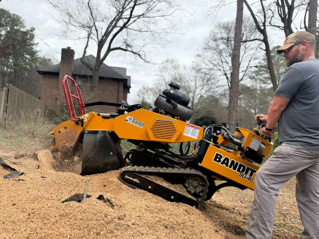 Nelson Stump operator grinding a stump with Bandit SG-40 stump grinder in Upstate SC